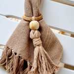 Argola de guardanapo decorativa bege Raízes de macramê