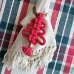 Argola de guardanapo de Natal vermelha de macramê